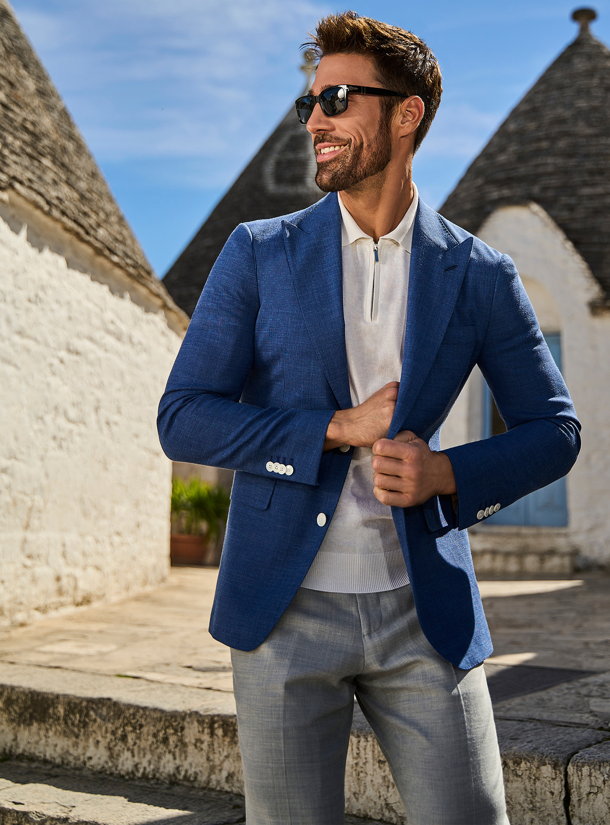 Consiglieri Catania's Class: rich blue jacket with a white polo and grey trousers