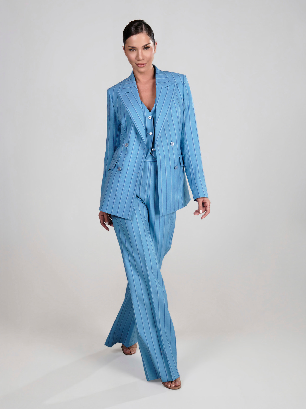 Pale blue pinstriped three-piece Consiglieri DONNA women's suit with a double-breasted blazer