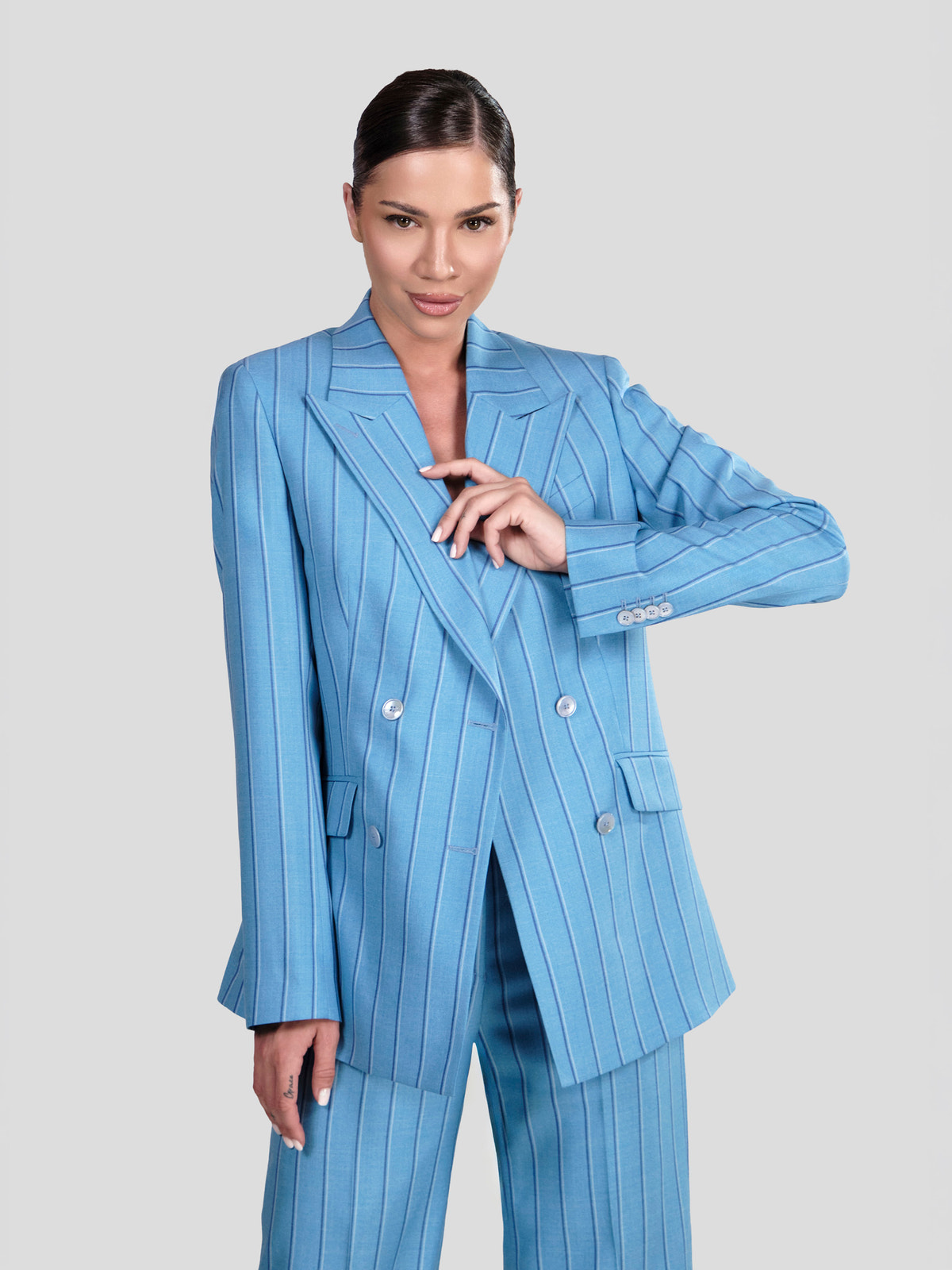 Pale blue pinstriped three-piece Consiglieri DONNA women's suit with a double-breasted blazer