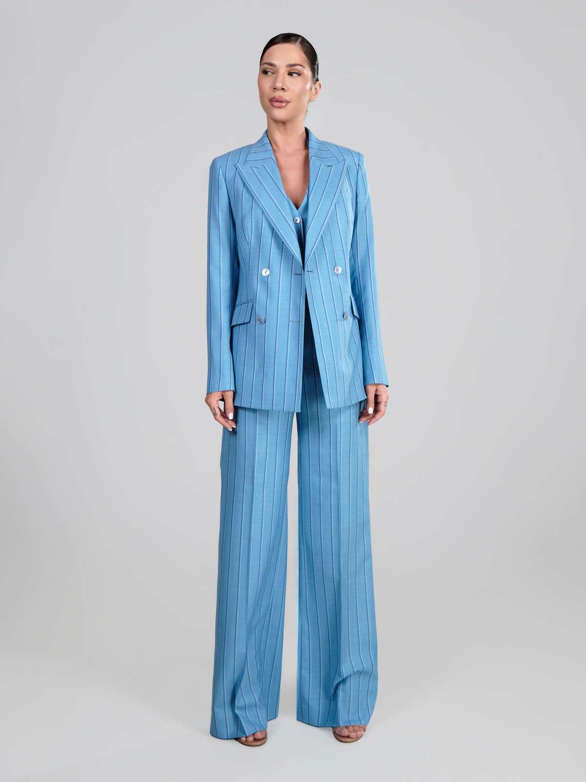 Pale blue pinstriped three-piece Consiglieri DONNA women's suit with a double-breasted blazer