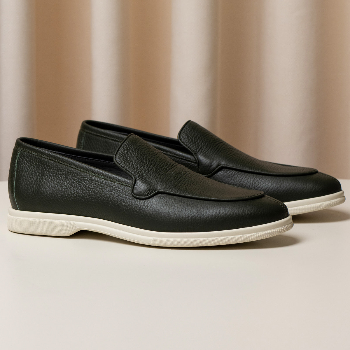 Consiglieri: dark green loafers with a fine texture and cream soles