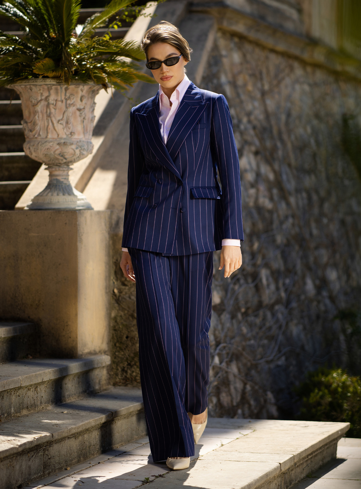 Navy pinstriped Consiglieri DONNA suit with a double-breasted blazer and wide-leg trousers