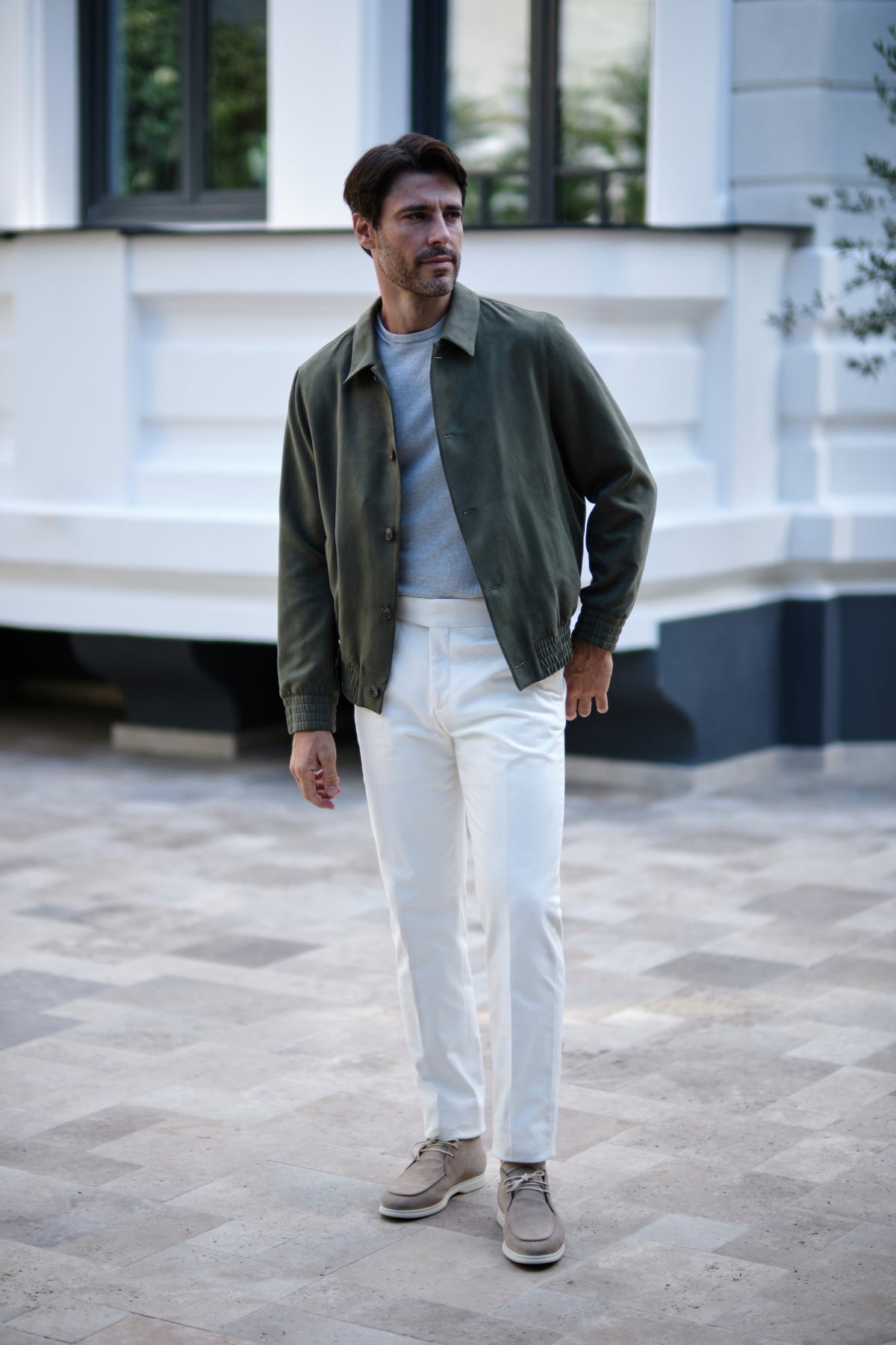 Olive jacket, ivory trousers — the complete look
