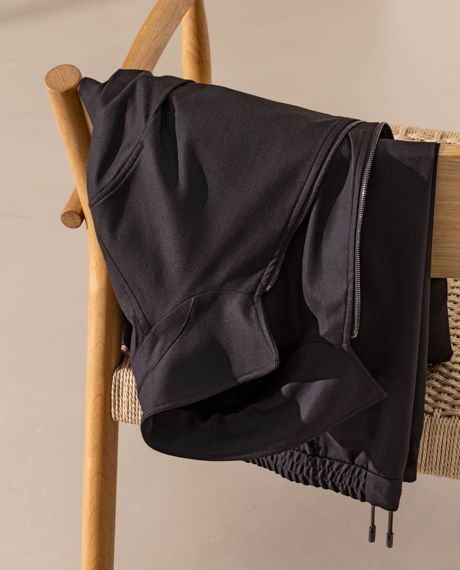 The fine texture and discreet zip of The Track Suit, in a Luxury Leisurewear interpretation.