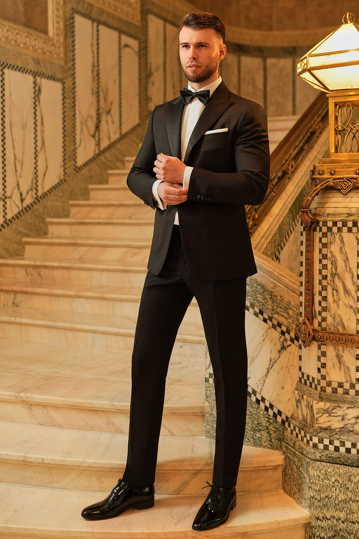 Consiglieri: black tuxedo with lustrous lapels, a white shirt and black bow tie