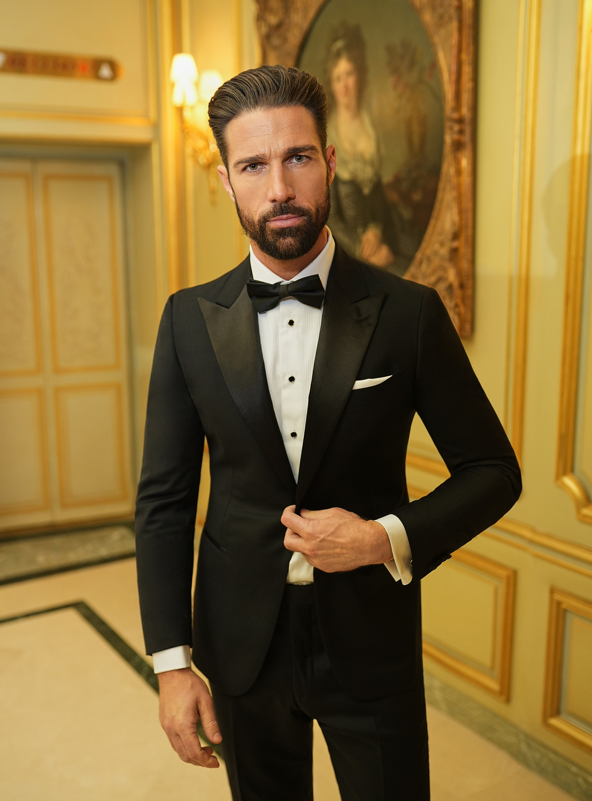 Consiglieri: black tuxedo with peak lapels and a black bow tie