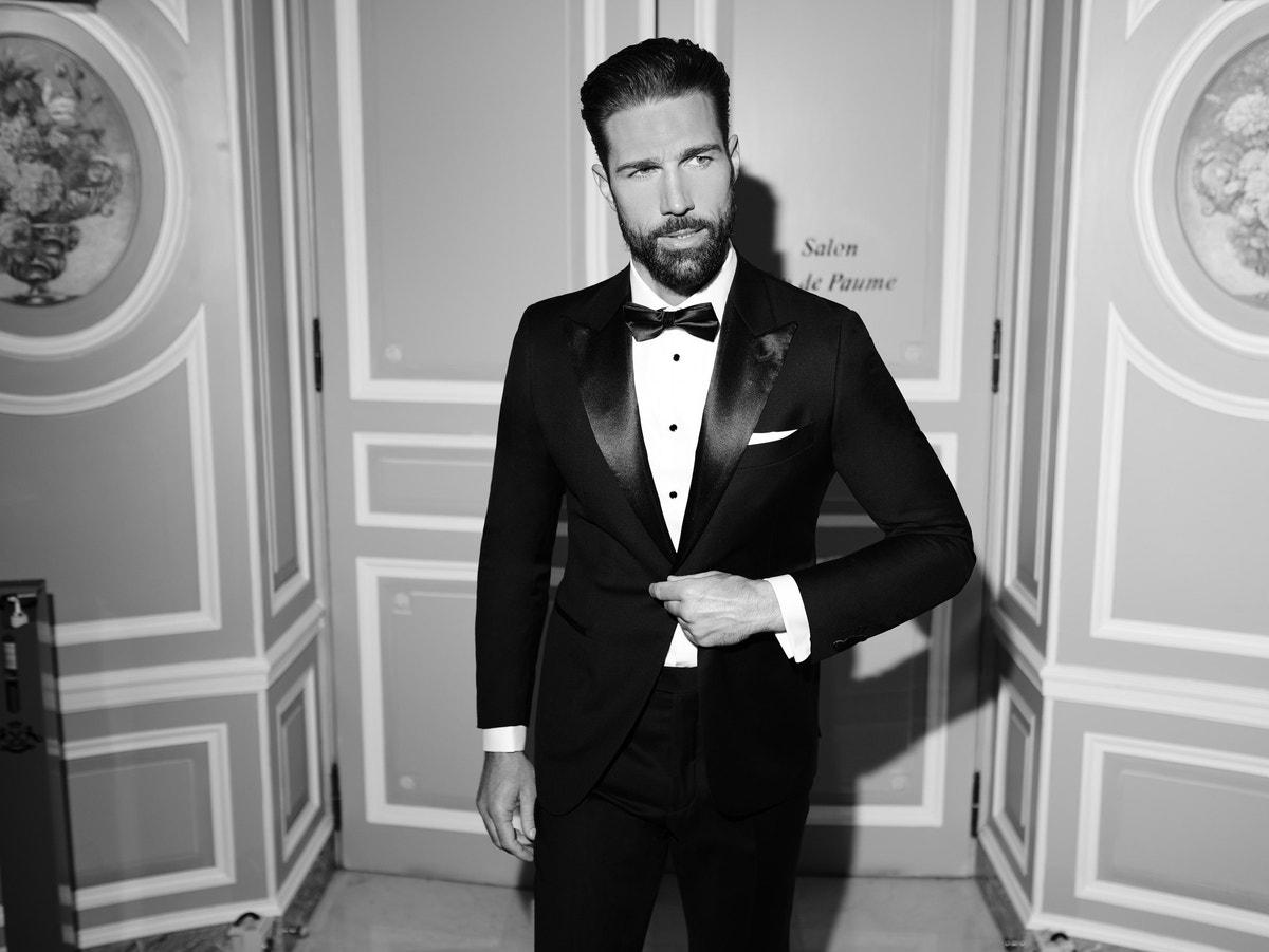 Black Tie ensemble with a bow tie, photographed in black and white