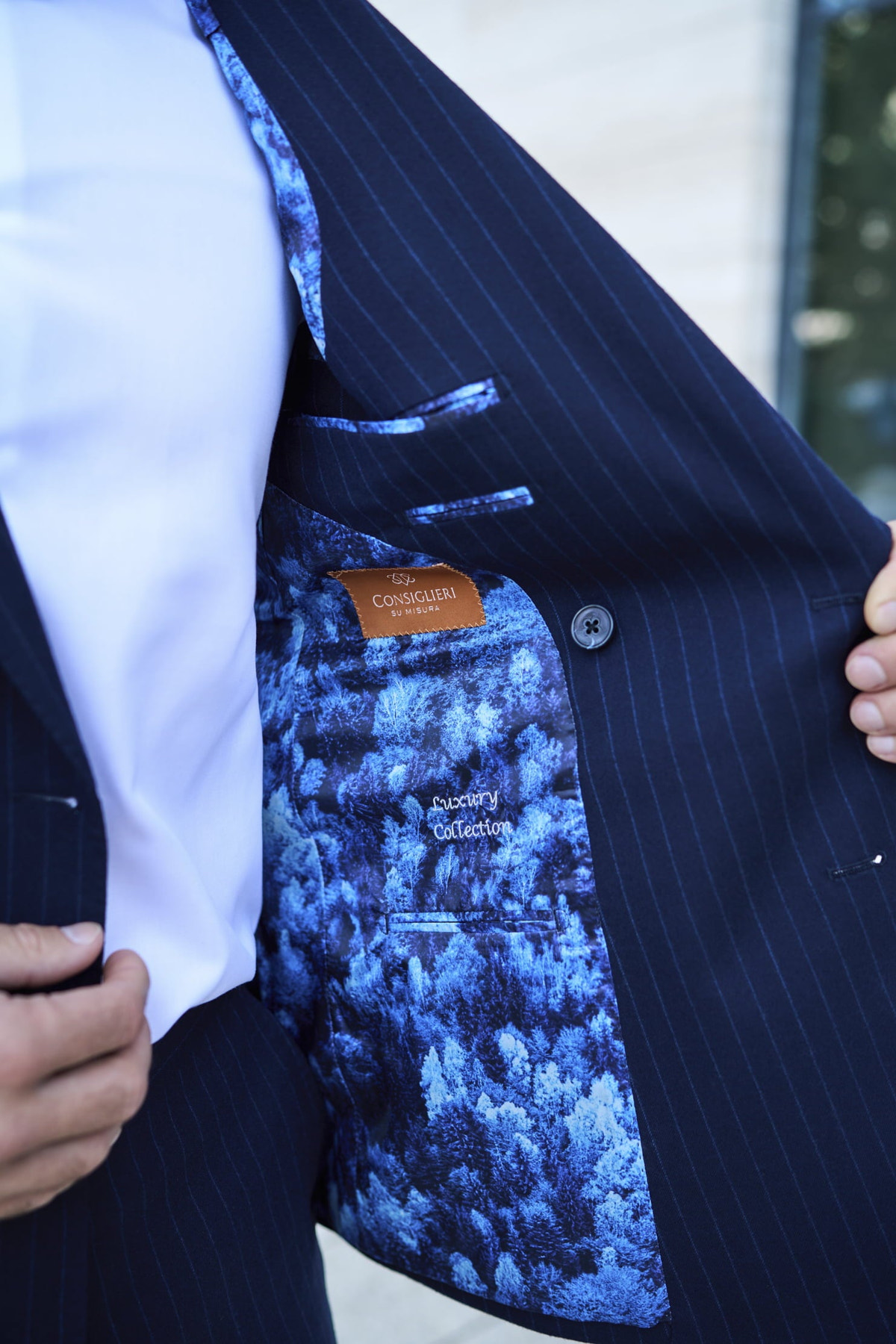 Inside the Consiglieri Mayfair jacket, with fine stripes, patterned blue lining and an inside pocket