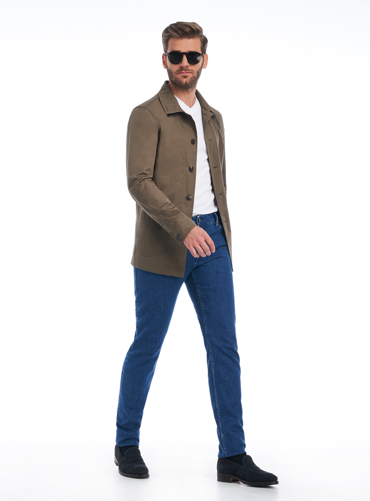 Khaki Consiglieri overshirt with a white T-shirt and blue jeans
