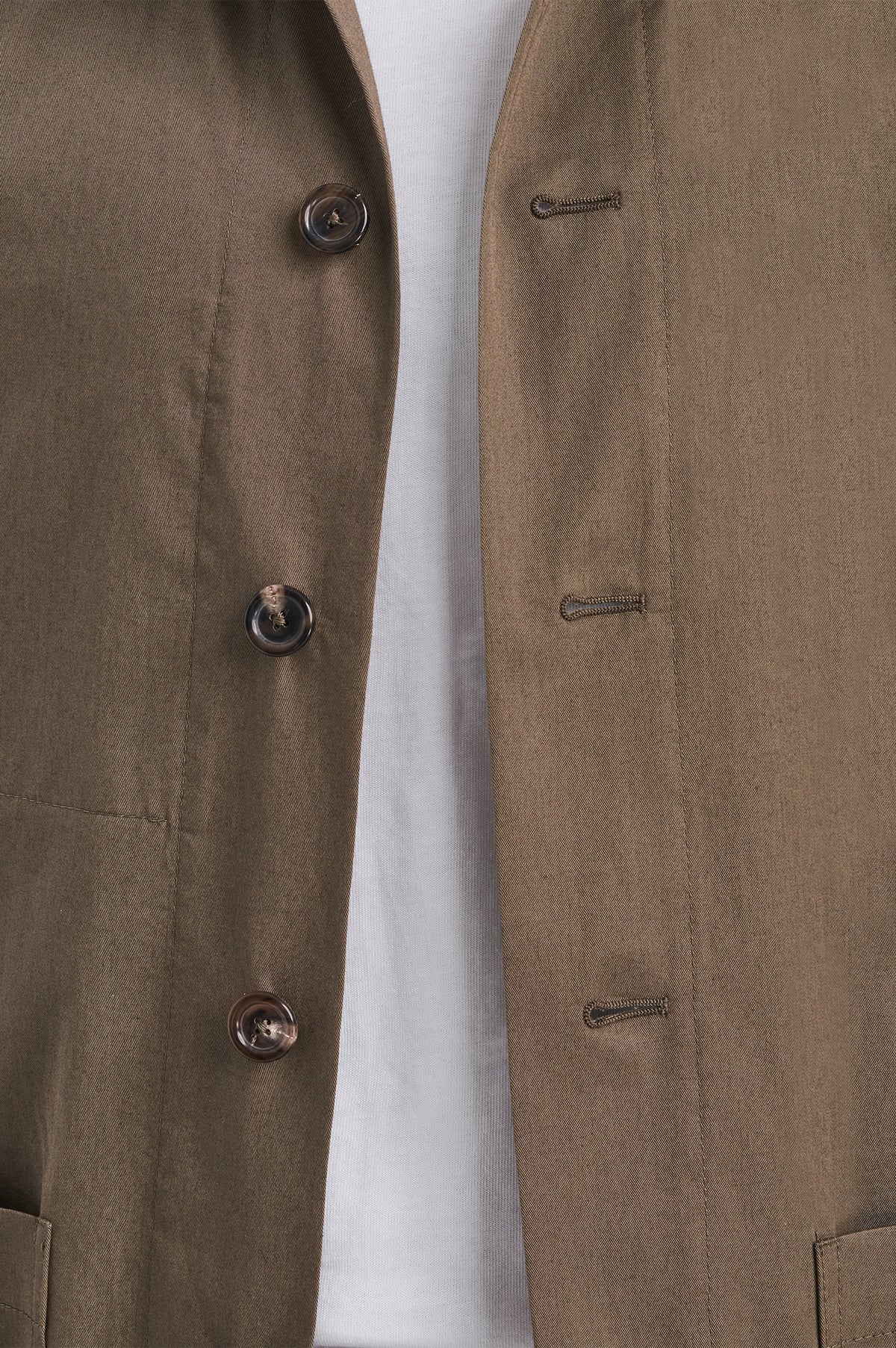 Dark buttons and the front of the khaki Safari Shirt Privé overshirt