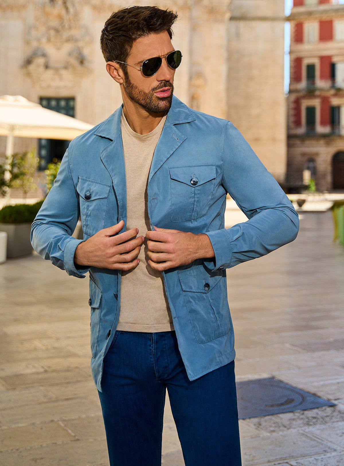 Consiglieri Siena: light blue safari jacket with patch pockets and blue trousers