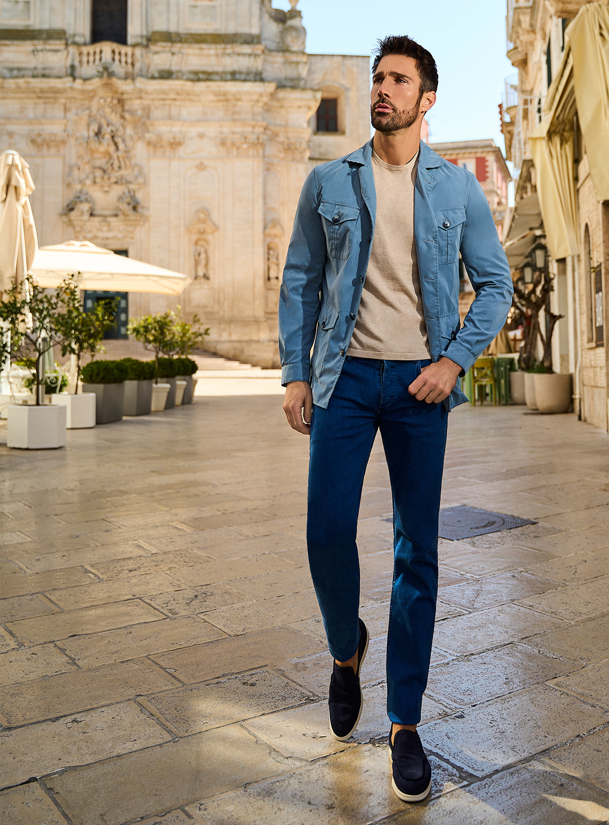 Consiglieri Firenze: light blue safari jacket with patch pockets and blue trousers