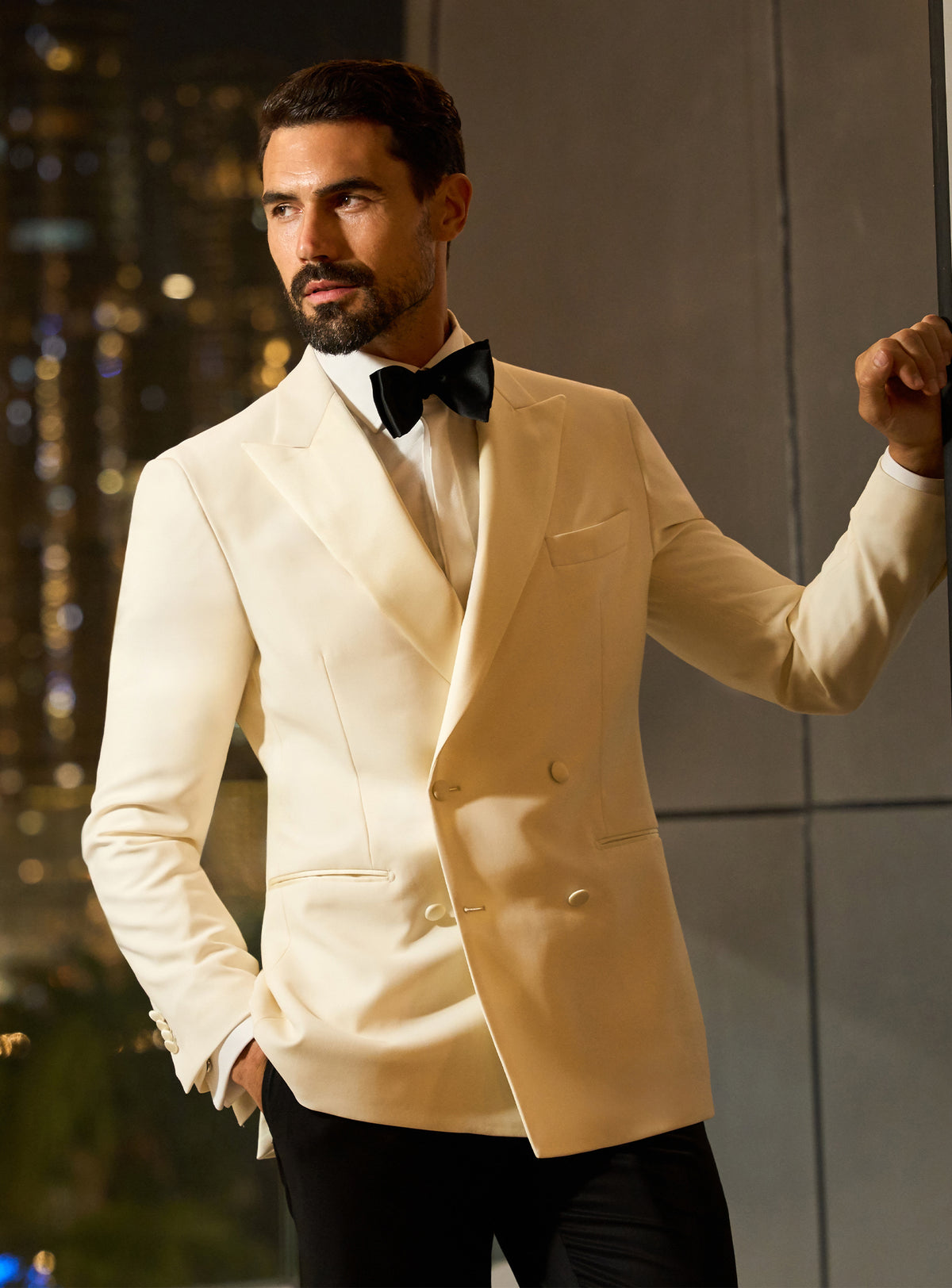 Ivory Consiglieri dinner jacket with a white shirt and black bow tie
