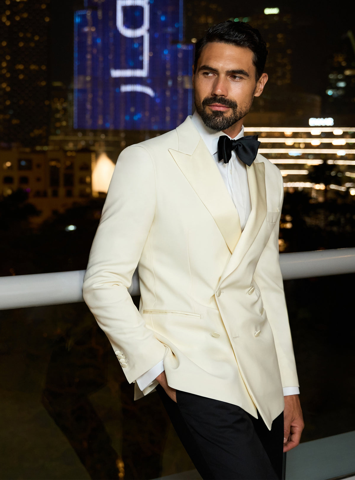 Ivory Consiglieri dinner jacket with a black bow tie and white shirt