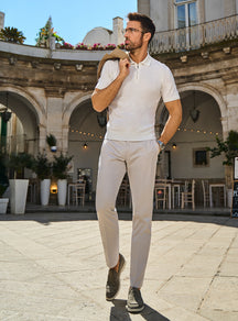 Consiglieri: white short-sleeved half-zip polo with cream trousers