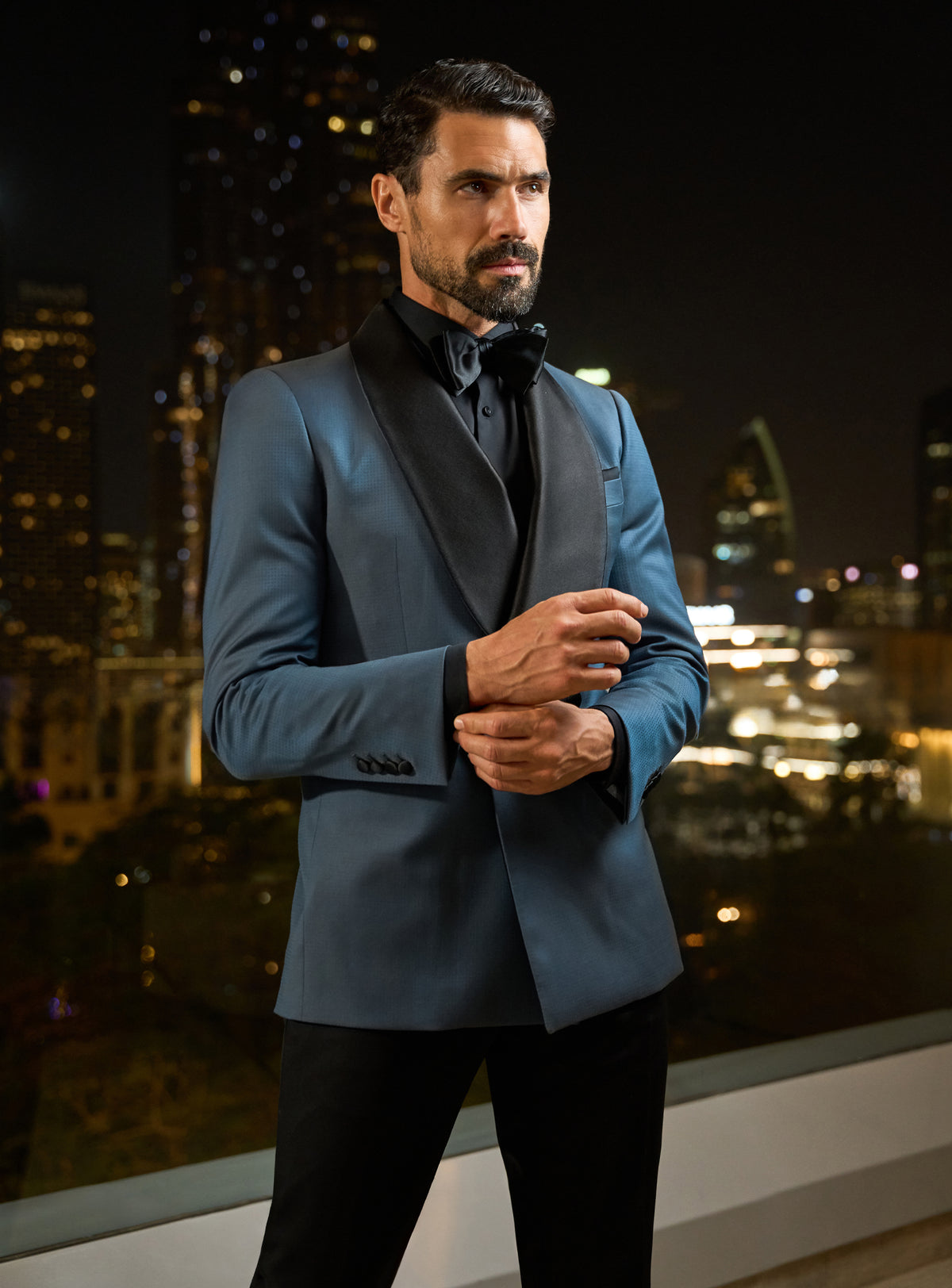 Petrol blue Consiglieri dinner jacket with black lapels and a black shirt