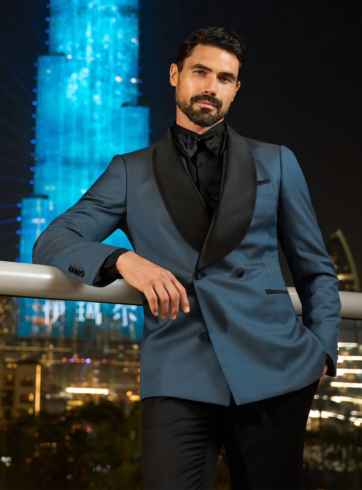Petrol blue Consiglieri dinner jacket with black lapels and a black shirt