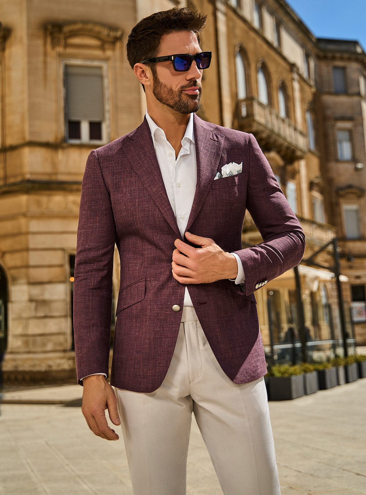 Consiglieri Roma Elegance: textured burgundy jacket with a white shirt and cream trousers