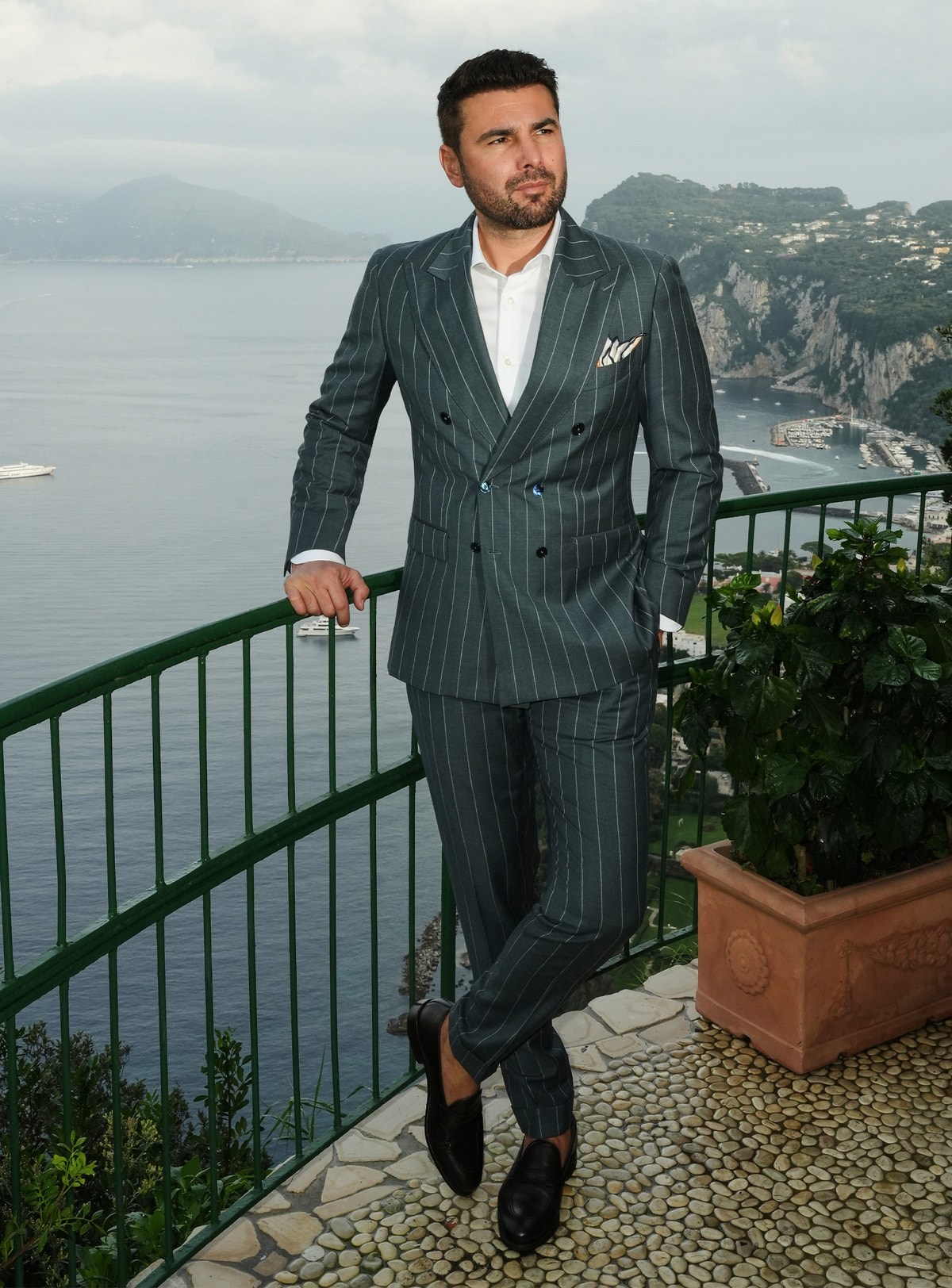 Dark green pinstriped double-breasted Consiglieri suit