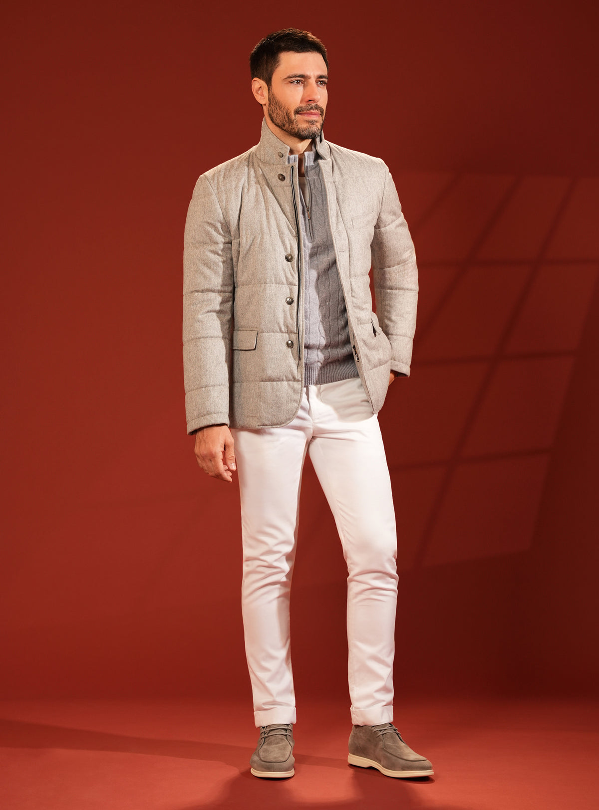 Grey-beige quilted Consiglieri jacket worn with white trousers