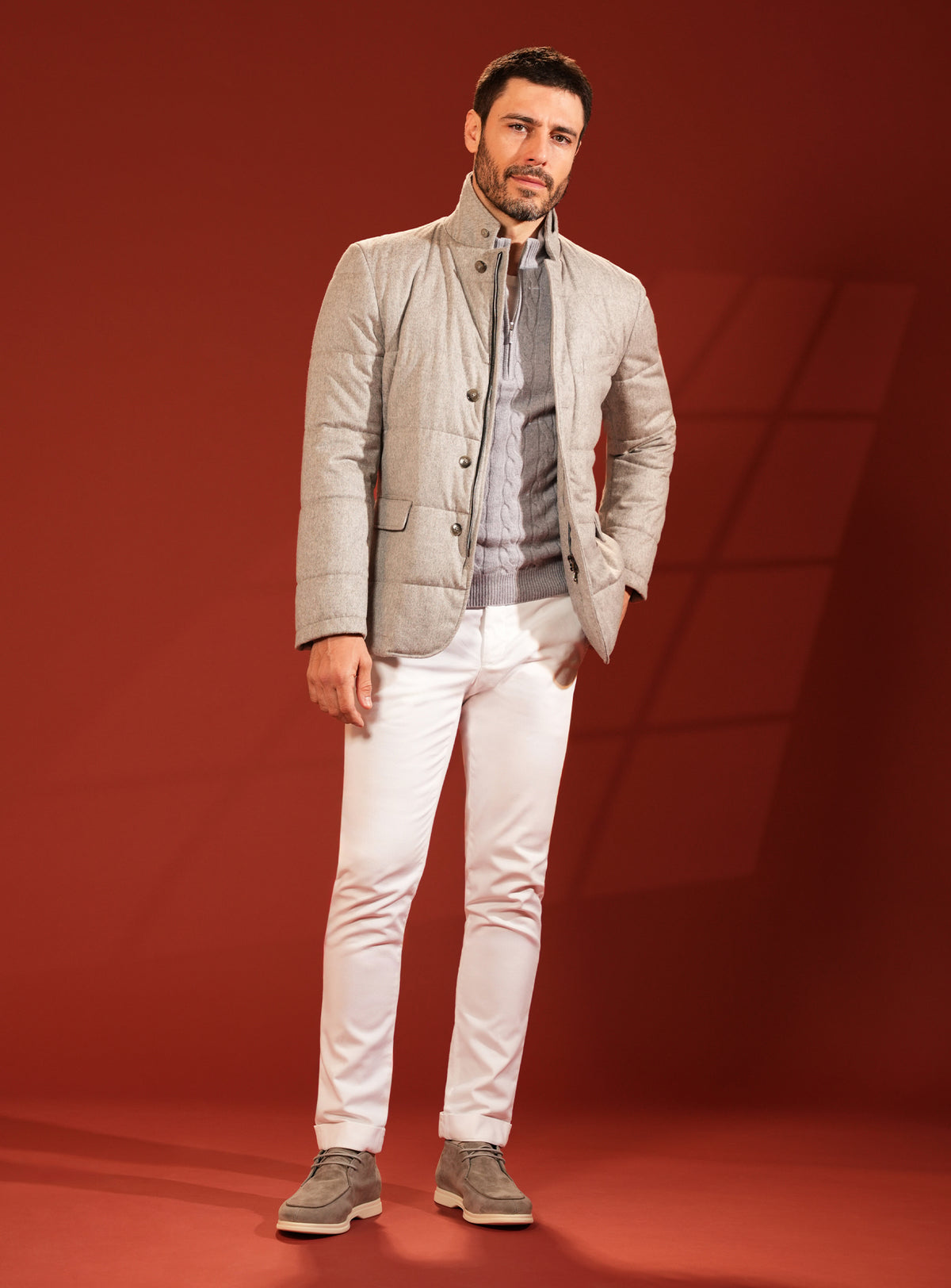Grey-beige quilted Consiglieri jacket worn with white trousers