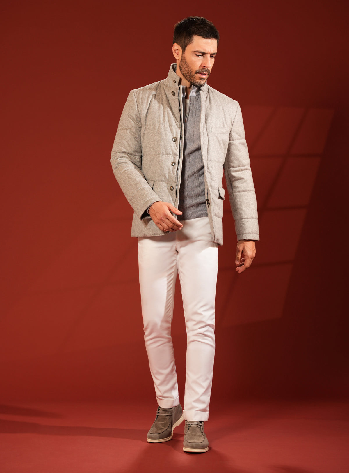 Grey-beige quilted Consiglieri jacket worn with white trousers