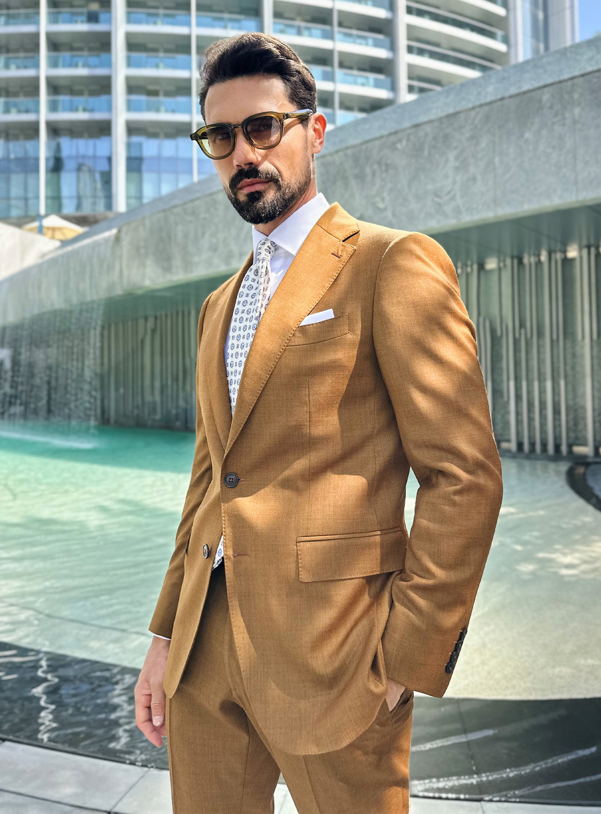 Ochre Consiglieri suit with a white shirt and pocket square