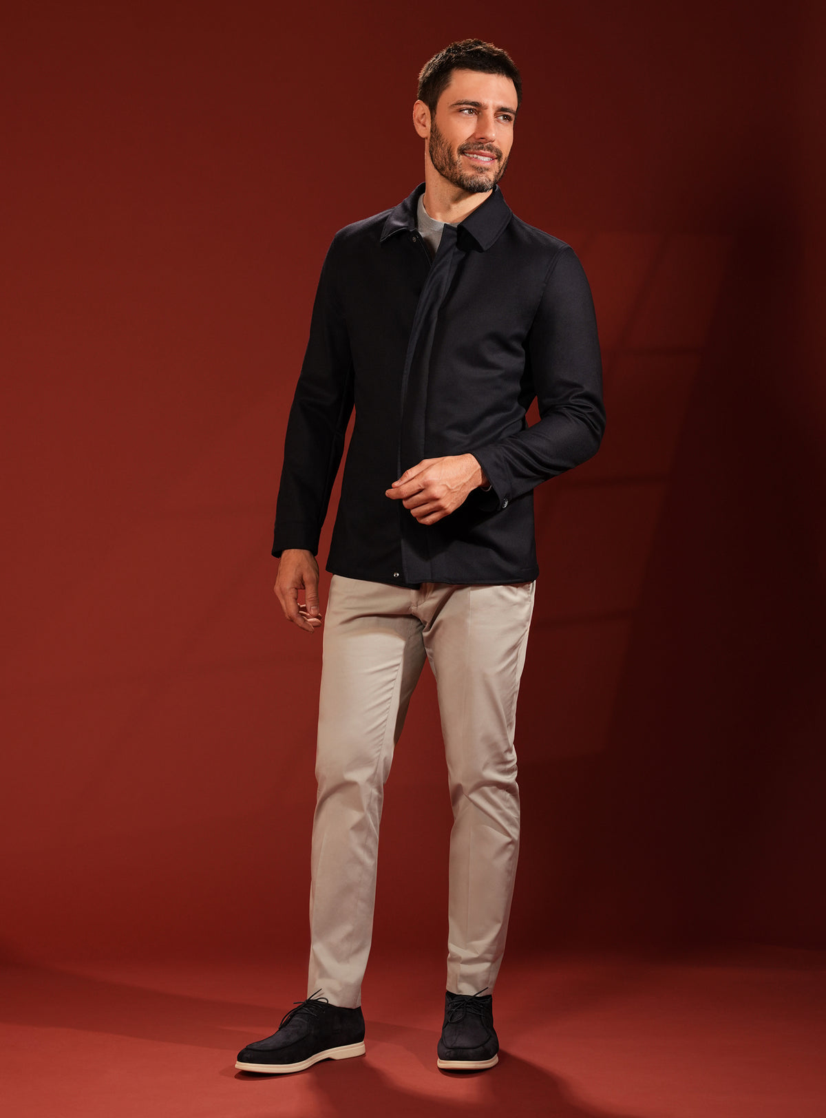 Deep navy Consiglieri jacket in a look with beige trousers
