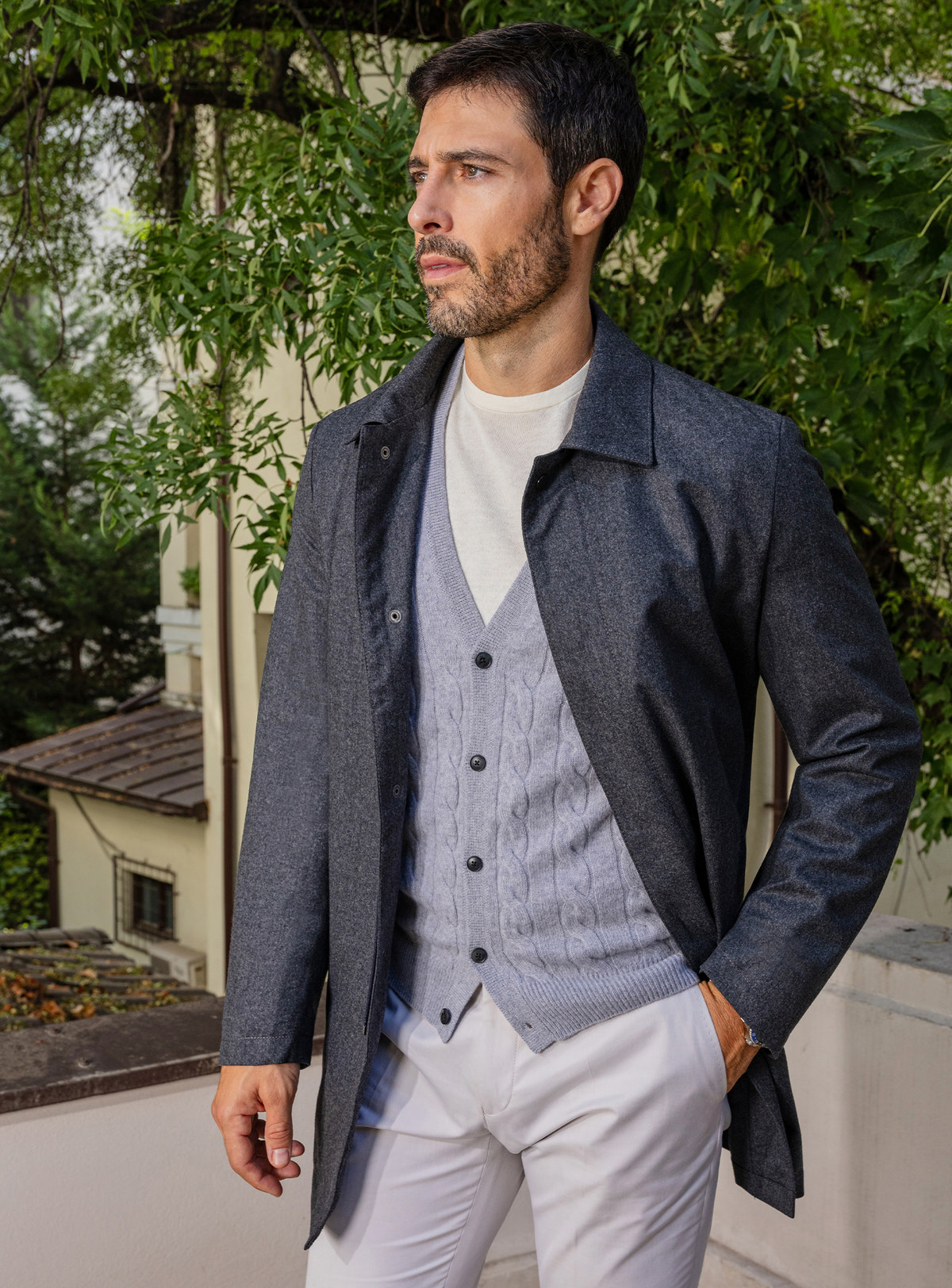Consiglieri: light grey cardigan beneath a long navy jacket