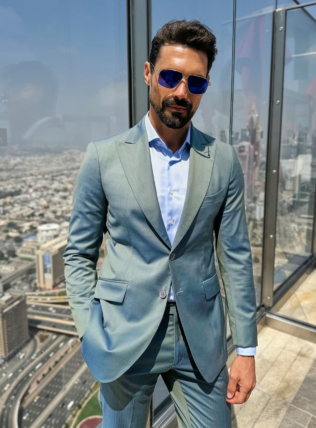 Consiglieri jacket in blue-green tones with a pale blue shirt