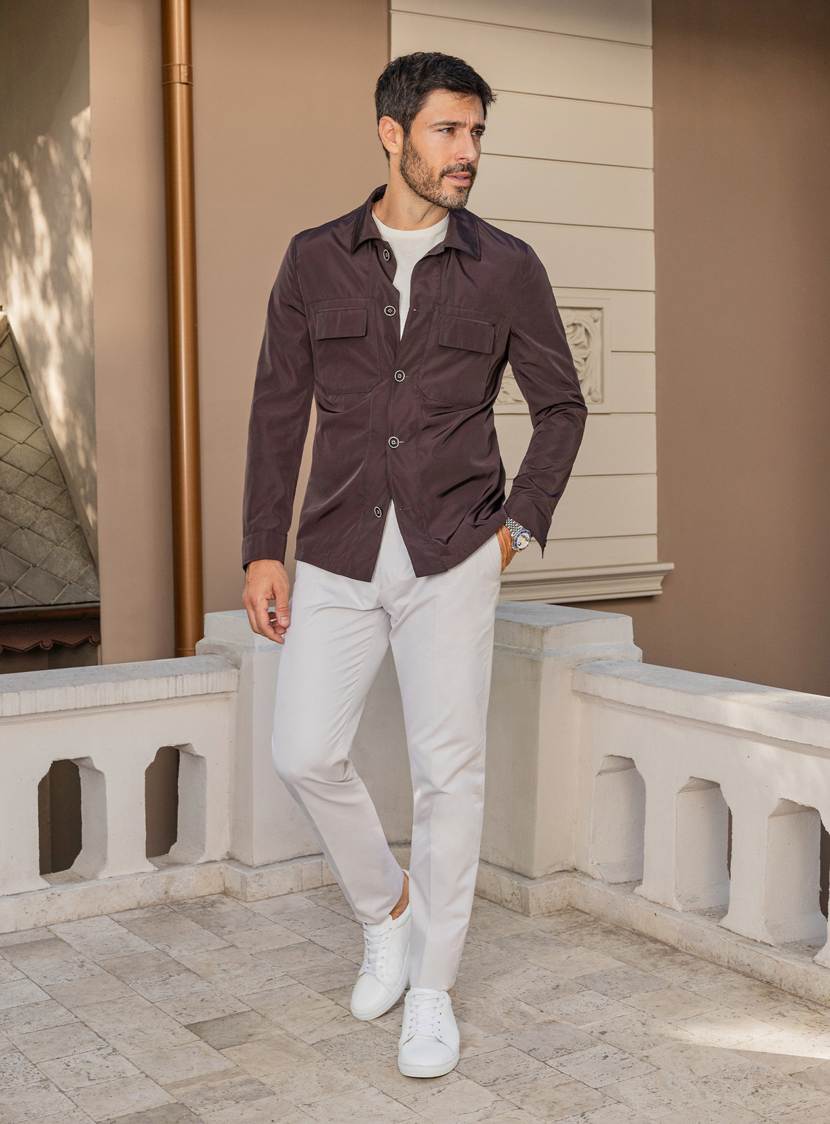 Consiglieri: dark brown chest-pocket jacket with ivory trousers