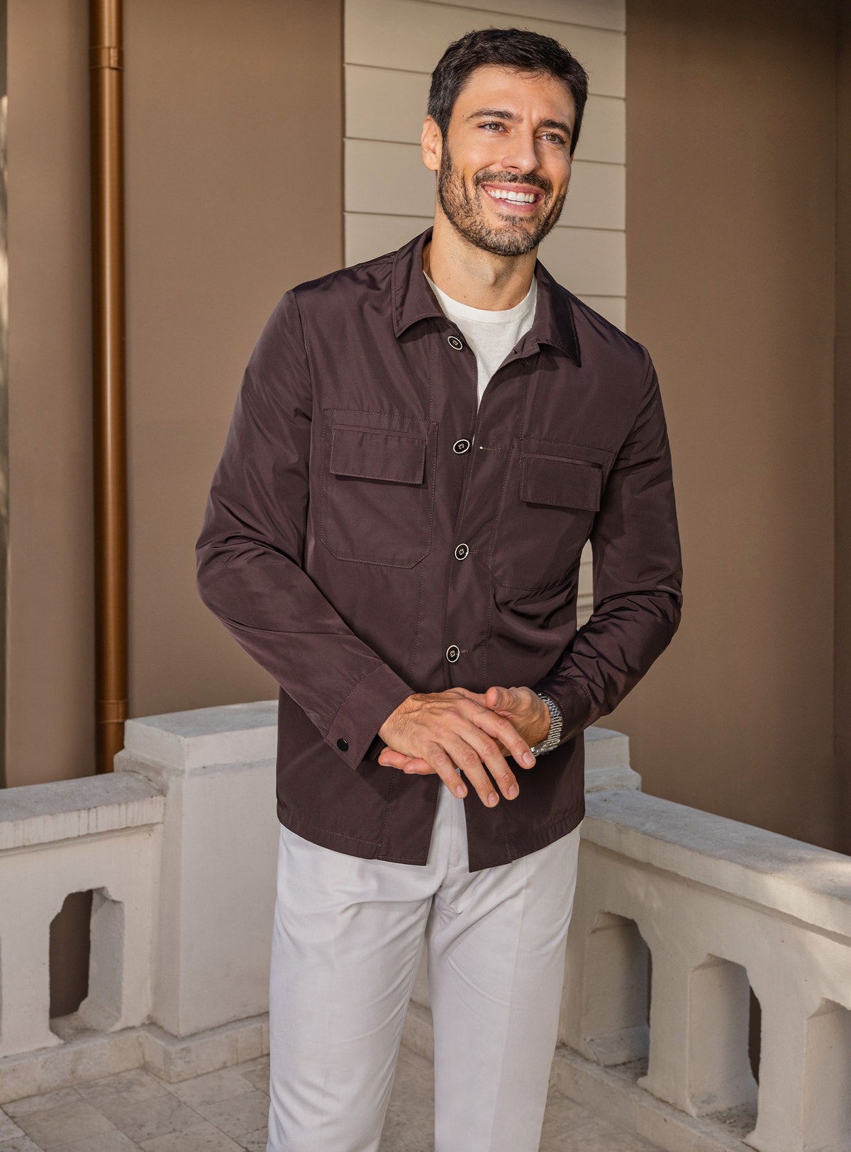 Consiglieri: dark brown chest-pocket jacket with ivory trousers