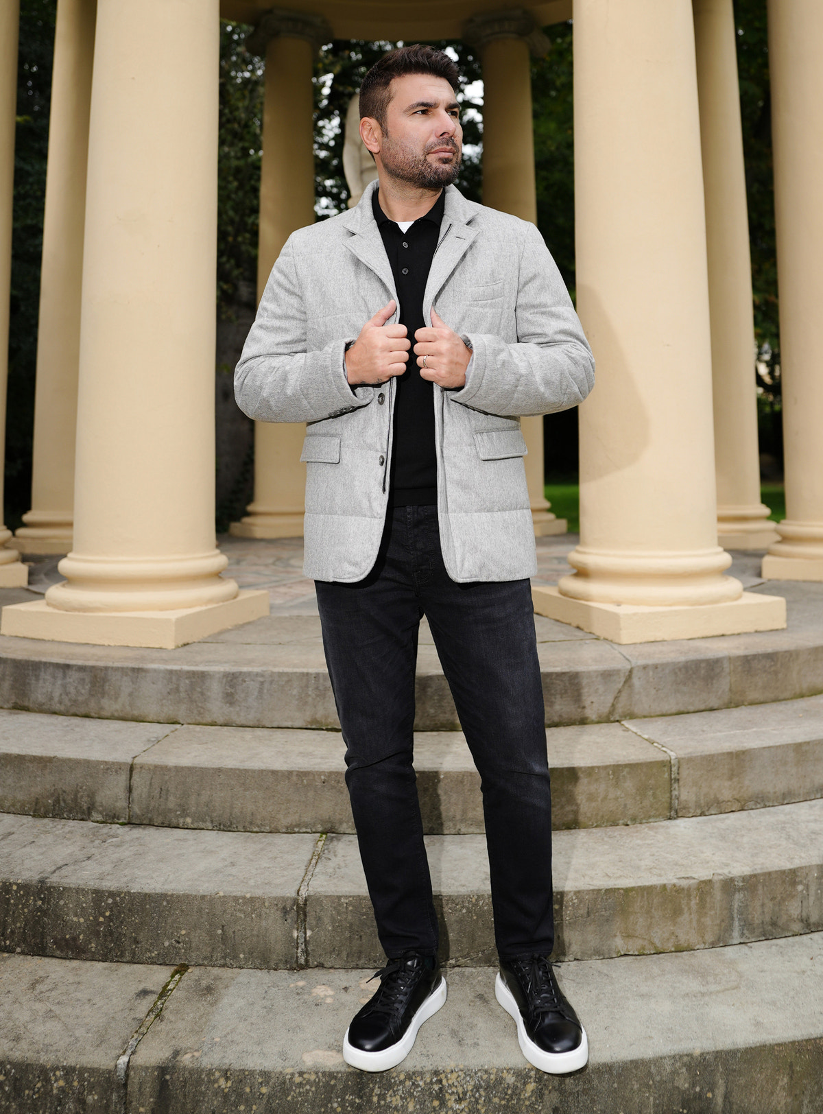Black Consiglieri jeans styled with a light grey jacket