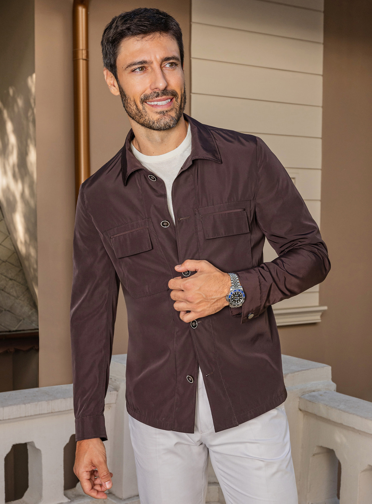 Consiglieri: dark brown chest-pocket jacket with ivory trousers