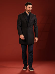 Consiglieri overcoat in very dark tones with navy trousers and coordinated shoes