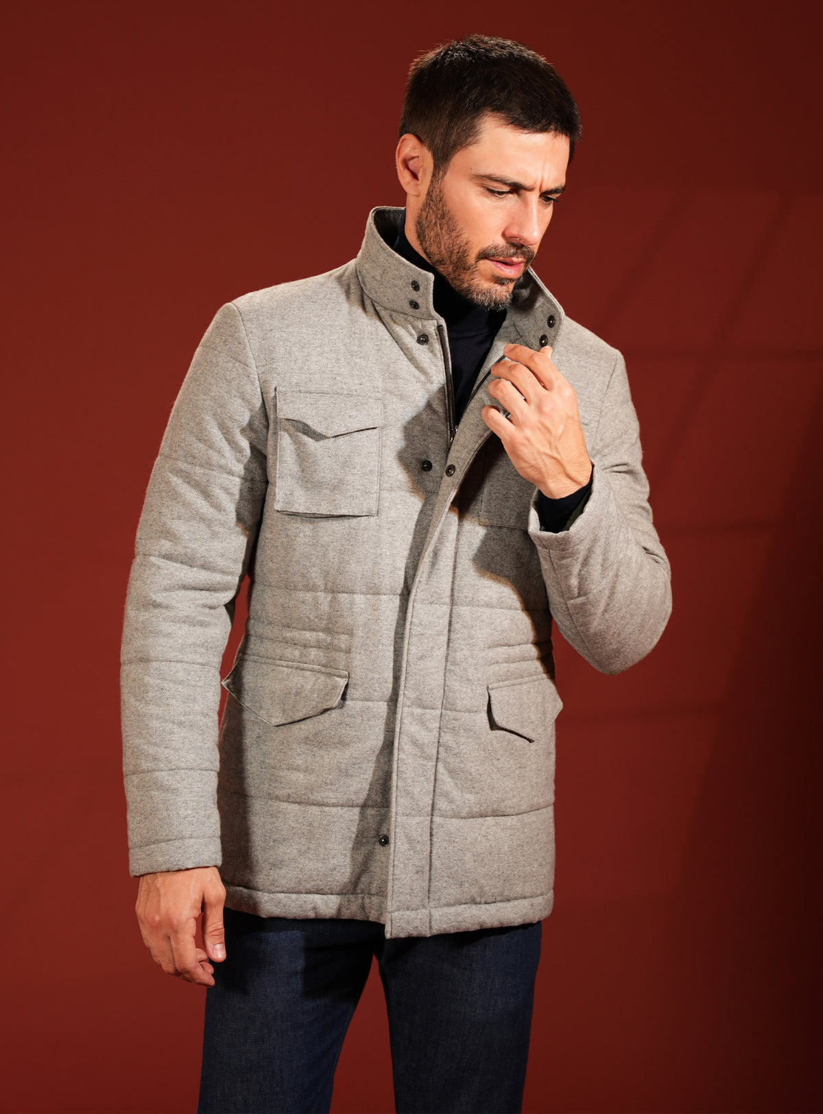 Beige quilted Consiglieri jacket with flap pockets and a raised collar