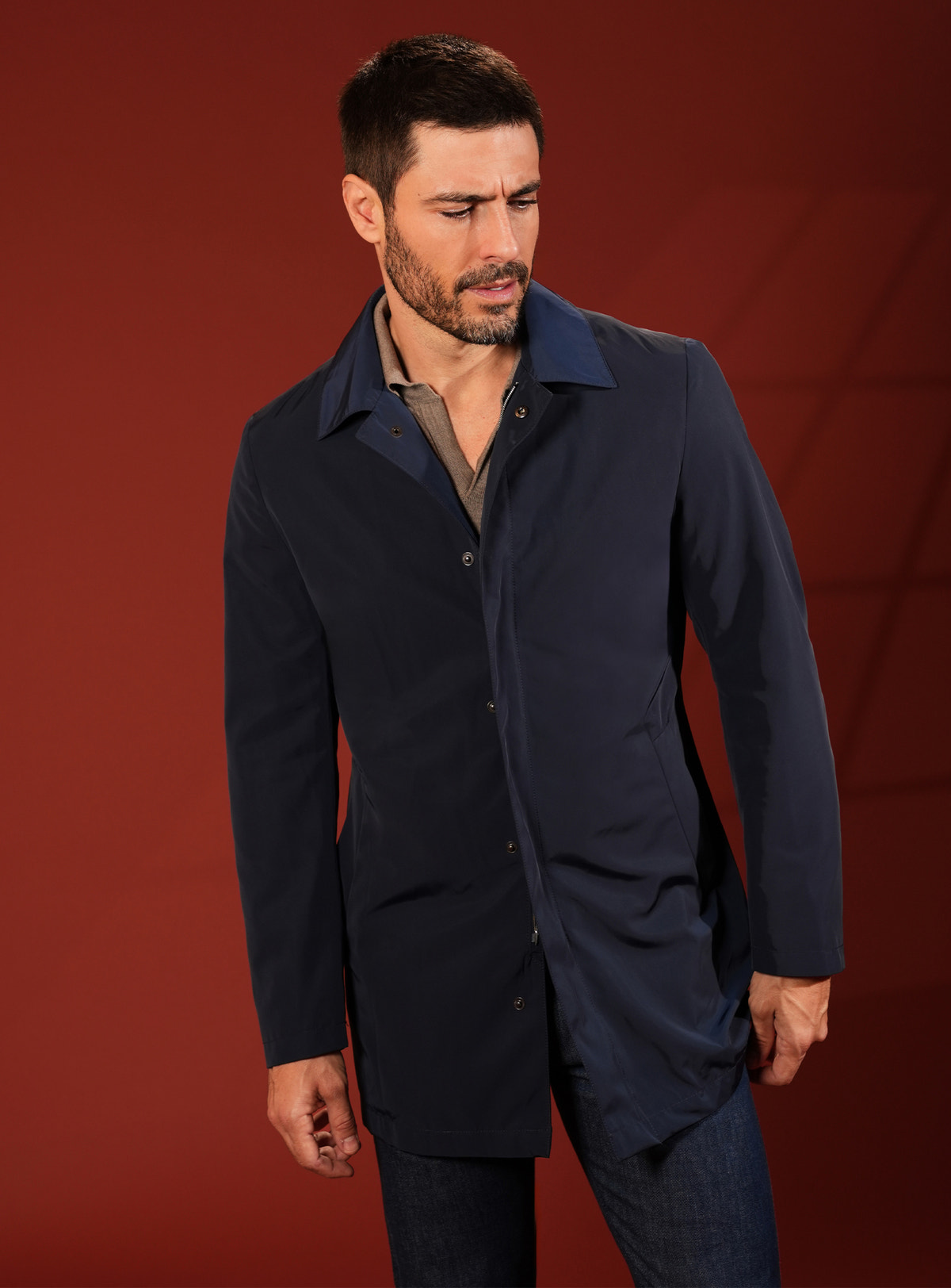 Navy Consiglieri short coat with a classic collar over a dark shirt