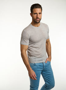 Consiglieri: light grey crew-neck T-shirt with blue jeans