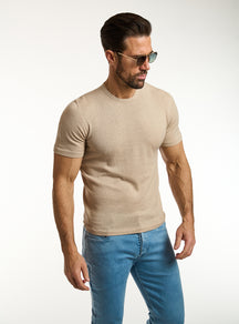 Consiglieri: beige crew-neck T-shirt with blue jeans