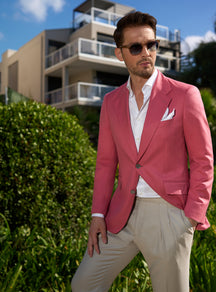 Pink Consiglieri jacket with a white shirt and pocket square