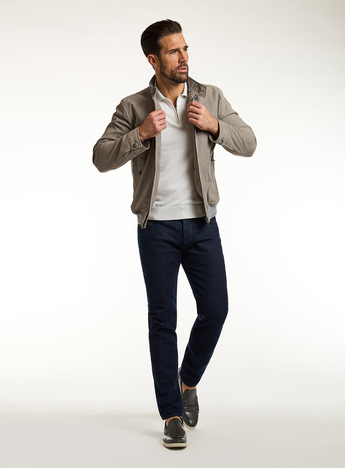 Consiglieri: taupe-grey zip-front jacket with an ivory polo and navy trousers
