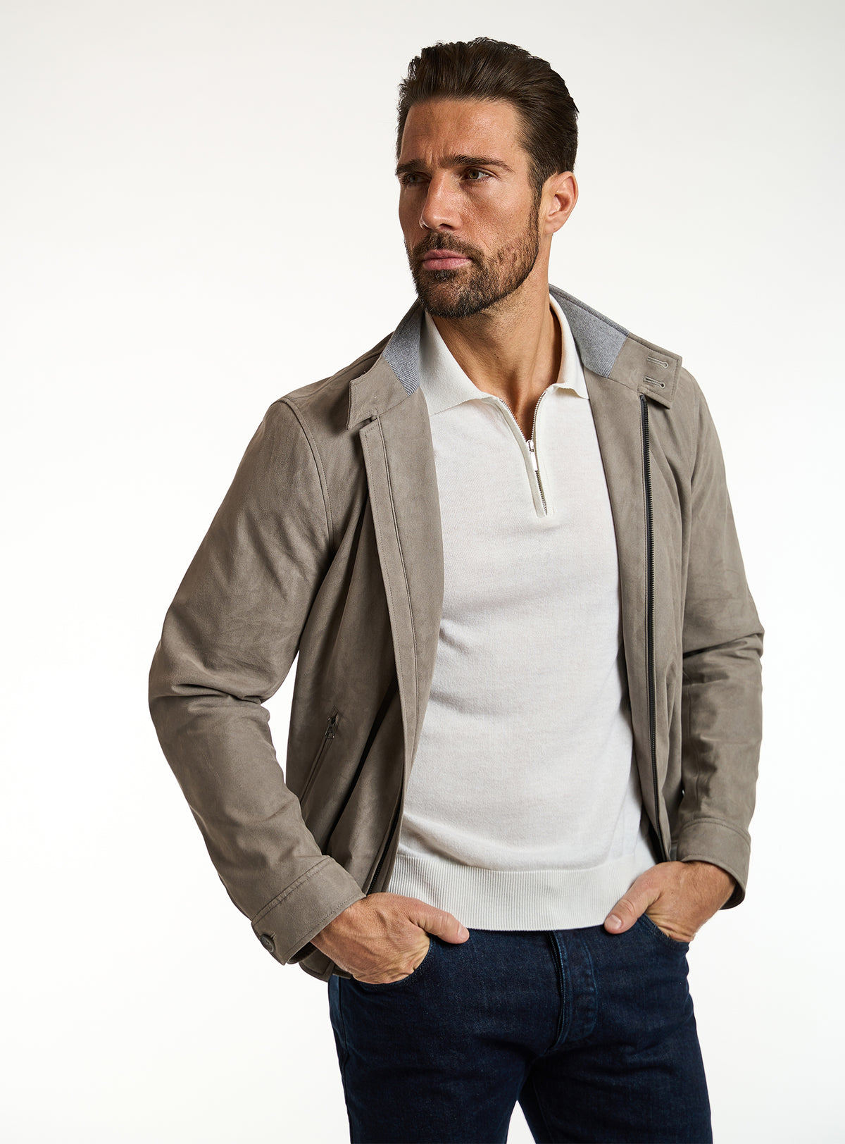 Consiglieri: taupe-grey zip-front jacket with an ivory polo and navy trousers