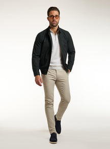 Consiglieri: beige chinos with a dark green jacket and ivory polo