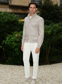 Beige Consiglieri shirt worn with white trousers in a relaxed look