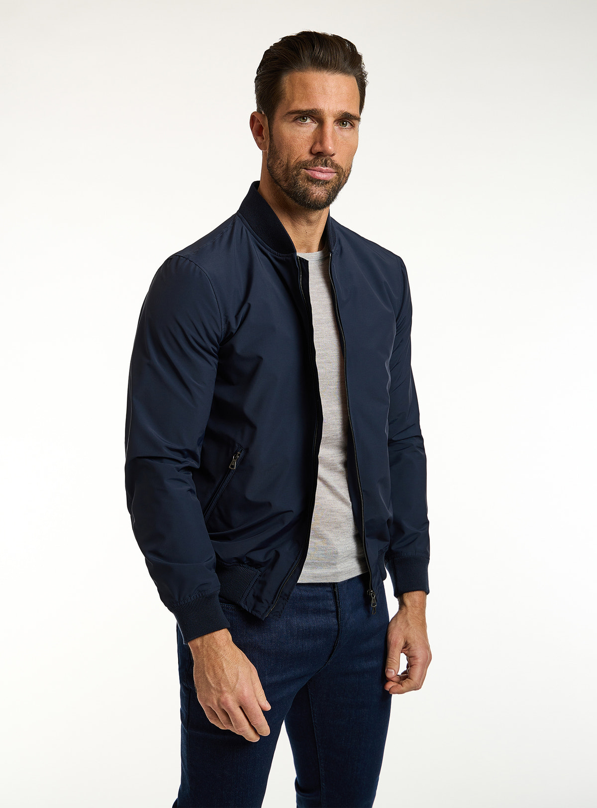 Consiglieri: navy zip-front bomber jacket with matching trousers