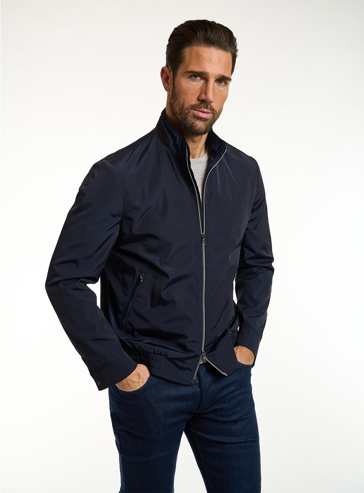 Consiglieri: navy zip-front bomber jacket with matching trousers
