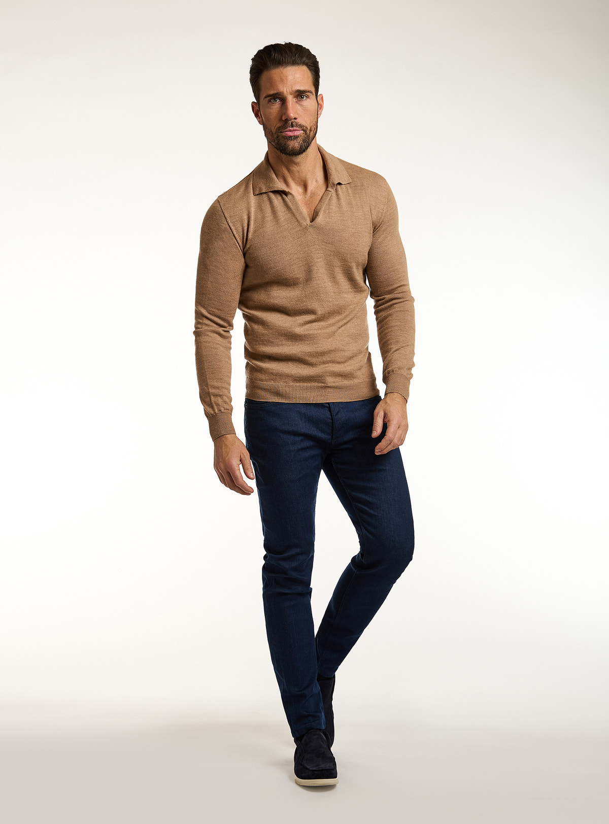 Consiglieri: navy jeans with a camel polo-collar sweater