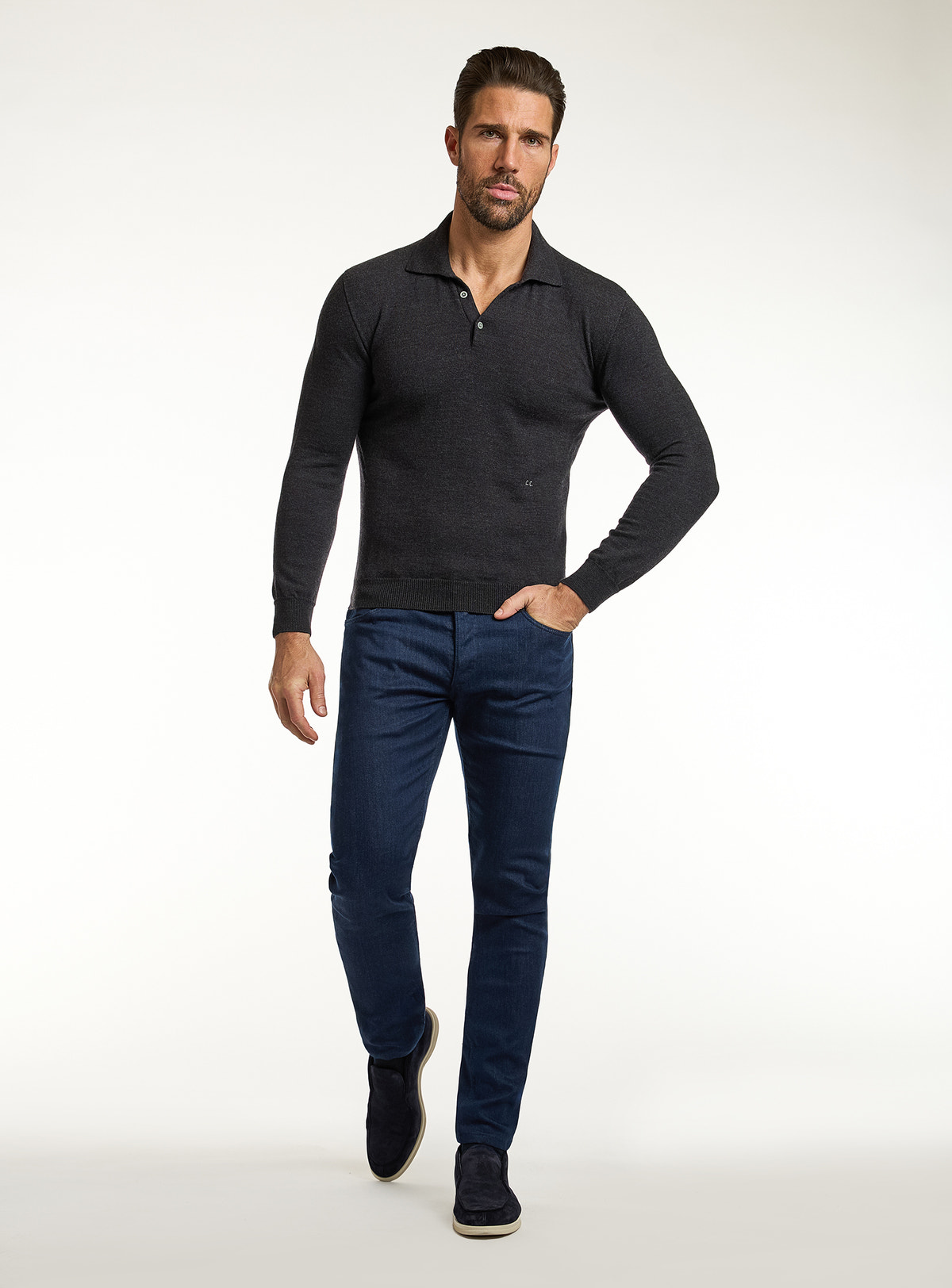 Consiglieri: black polo-collar sweater with navy jeans