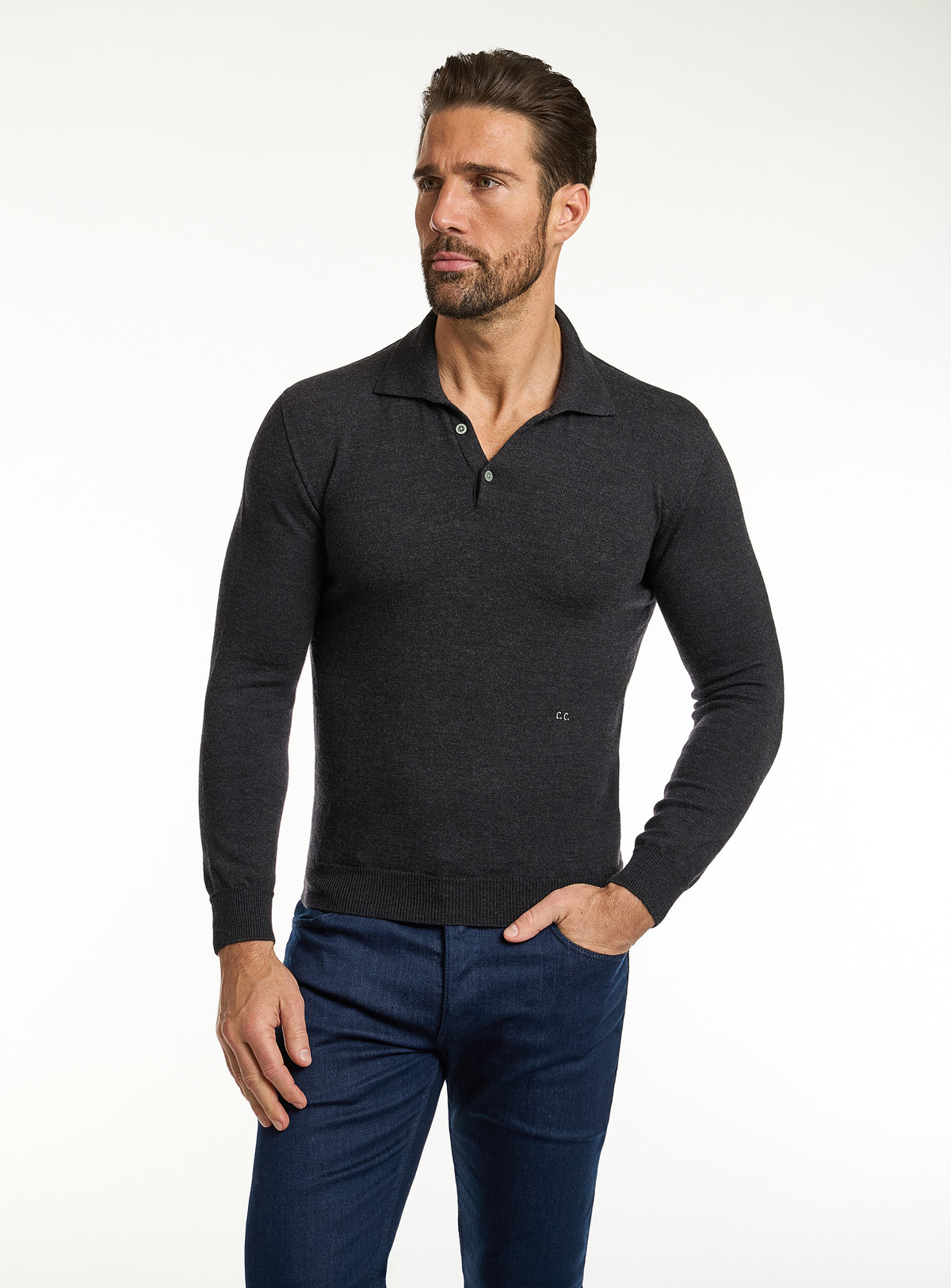 Consiglieri: black polo-collar sweater with navy jeans