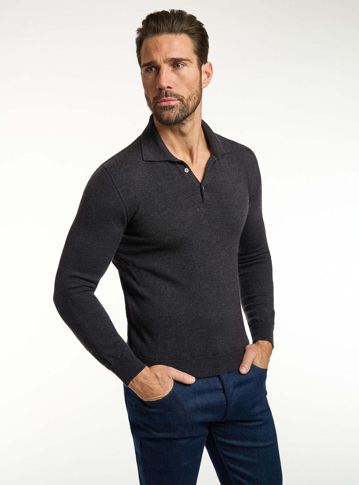 Consiglieri: black polo-collar sweater with navy jeans